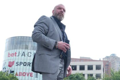 Triple H Posts Picture With Arn Anderson And His Son